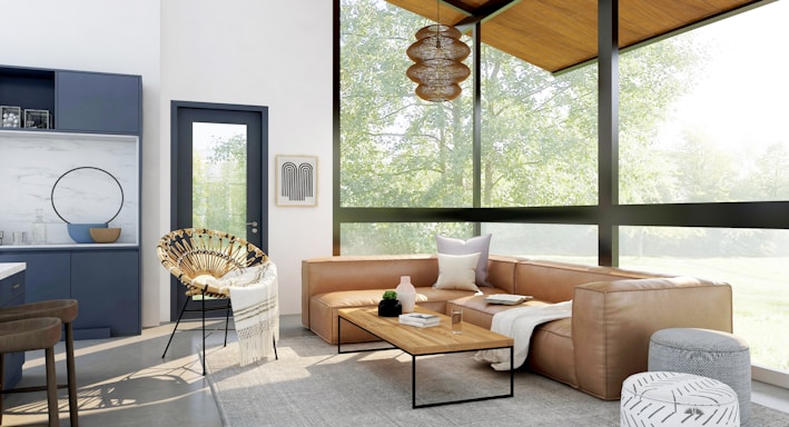 living room with brown sofa and glass window