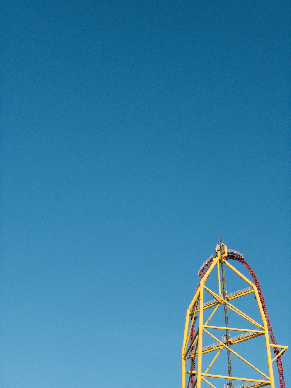 white metal tower under blue sky during daytime