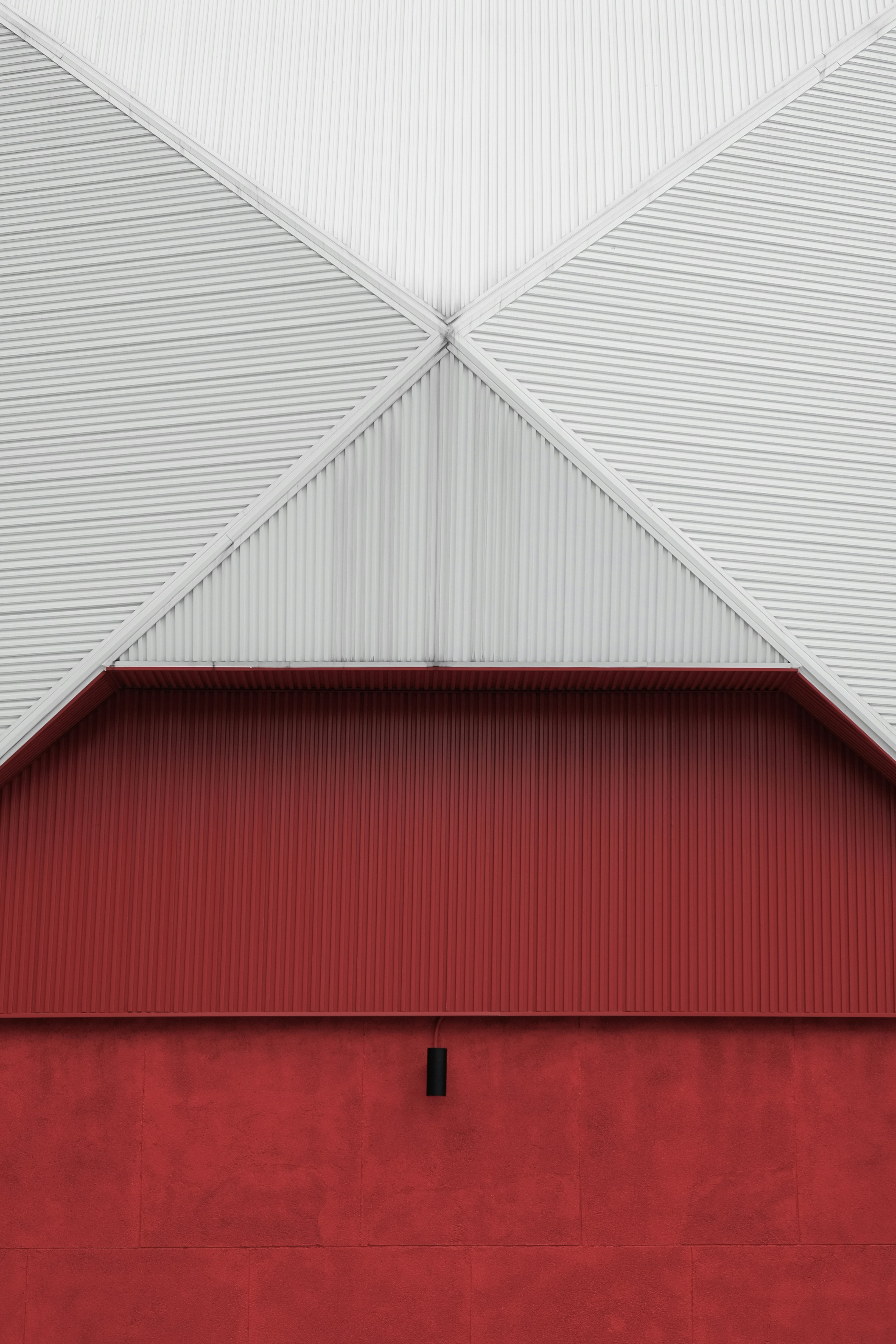 red and white wooden barn