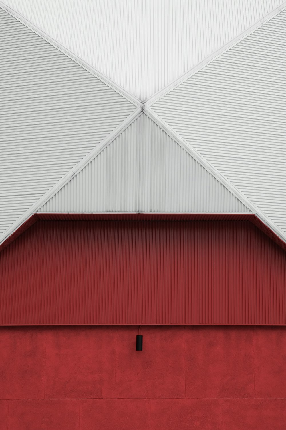 red and white wooden barn
