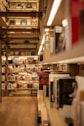 brown wooden shelf with books