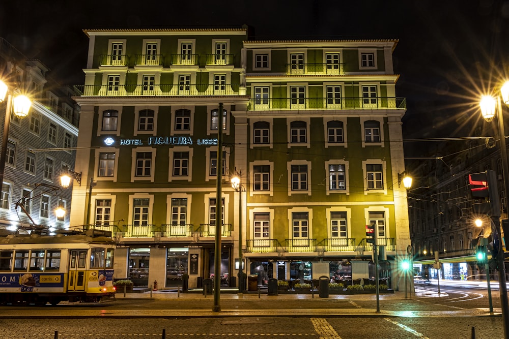 beige concrete building during night time