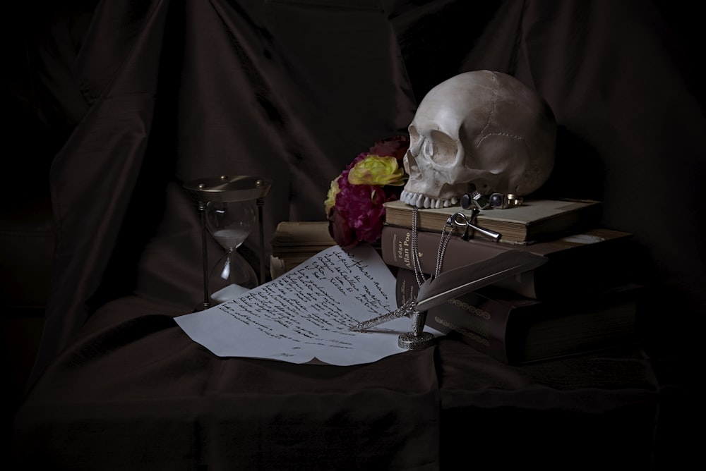 white and black printed paper on brown wooden table