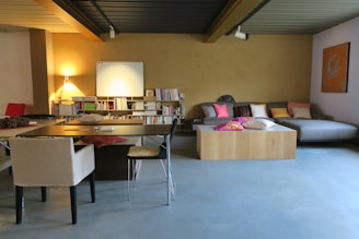 brown wooden table with chairs