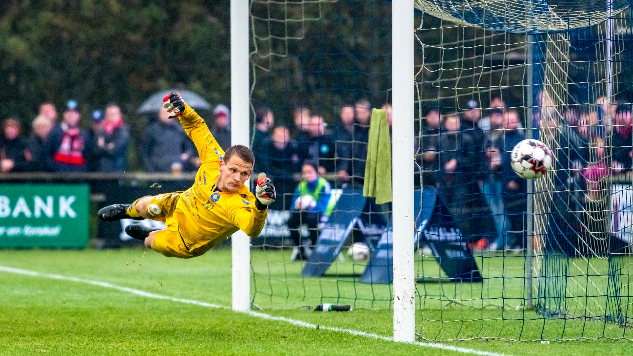goalkeeper diving save football