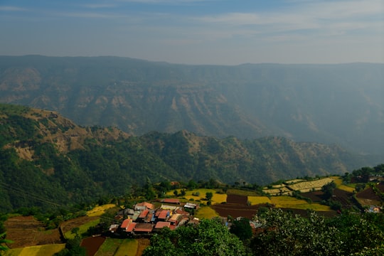 aerial view of green mountains during daytime in Mahabaleshwar India