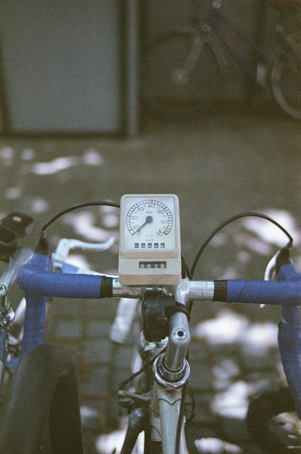 white and blue electric meter