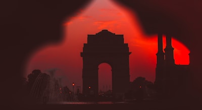 silhouette of a building during sunset