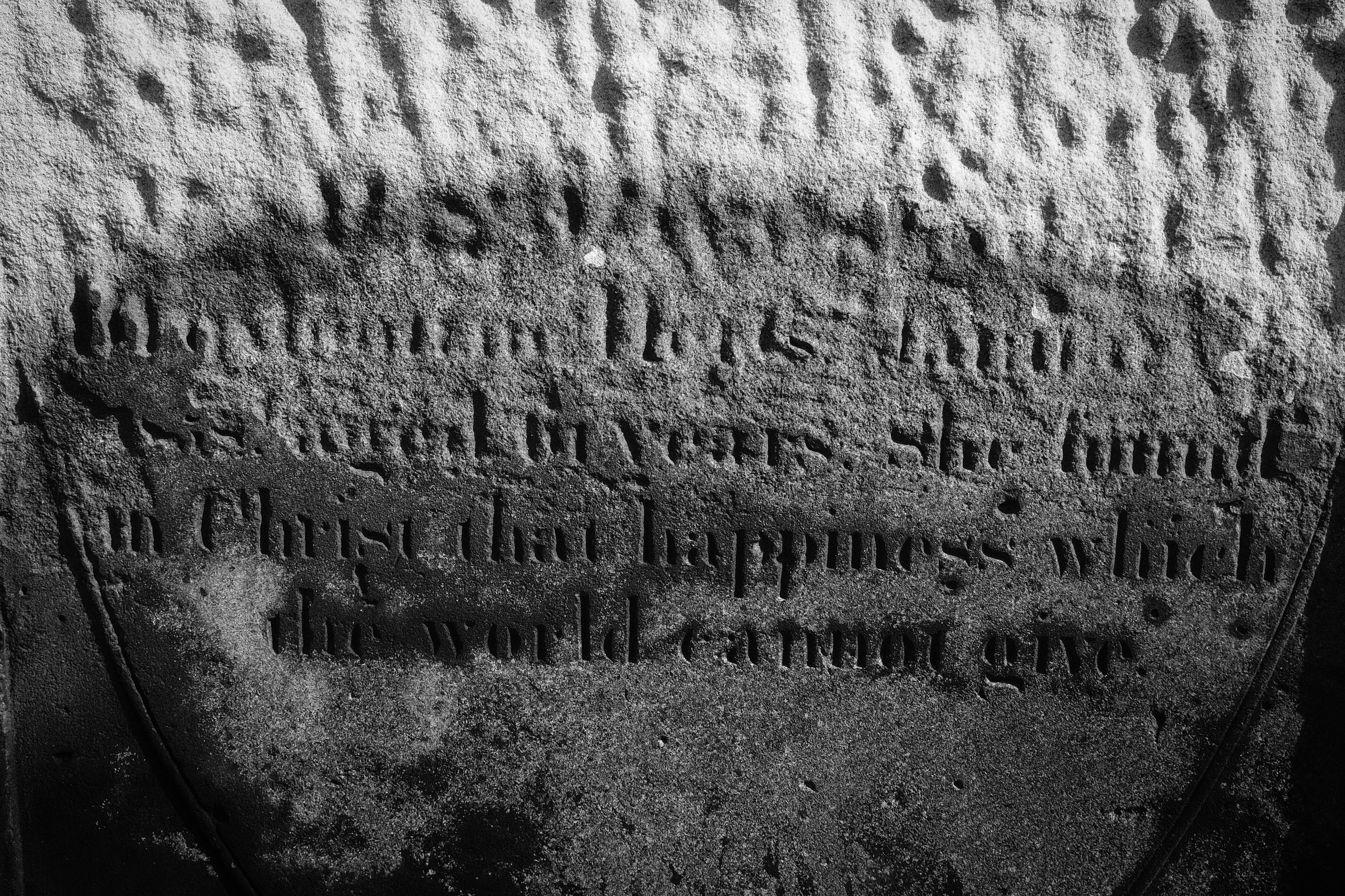 a close up of a stone with writing on it