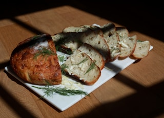 green and brown vegetable dish on white ceramic plate