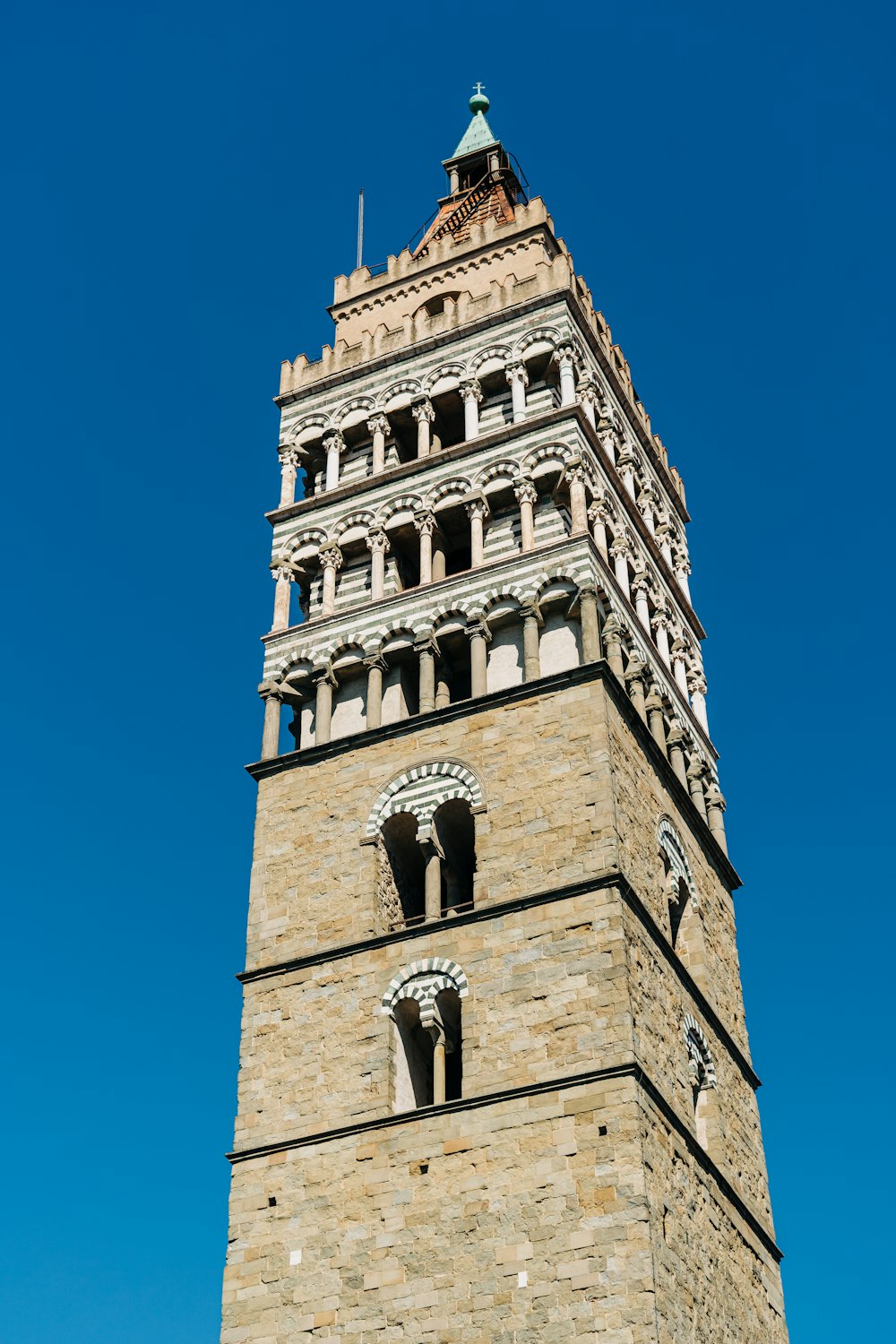 brown concrete building under blue sky during daytime