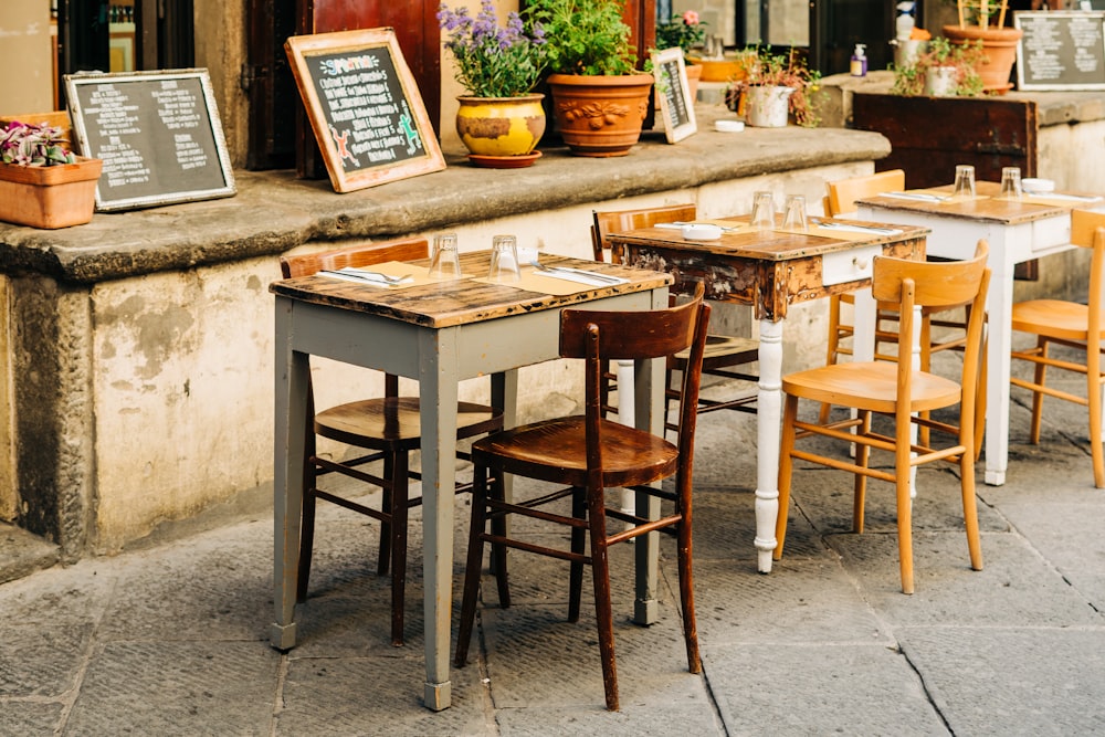 brown wooden table with chairs