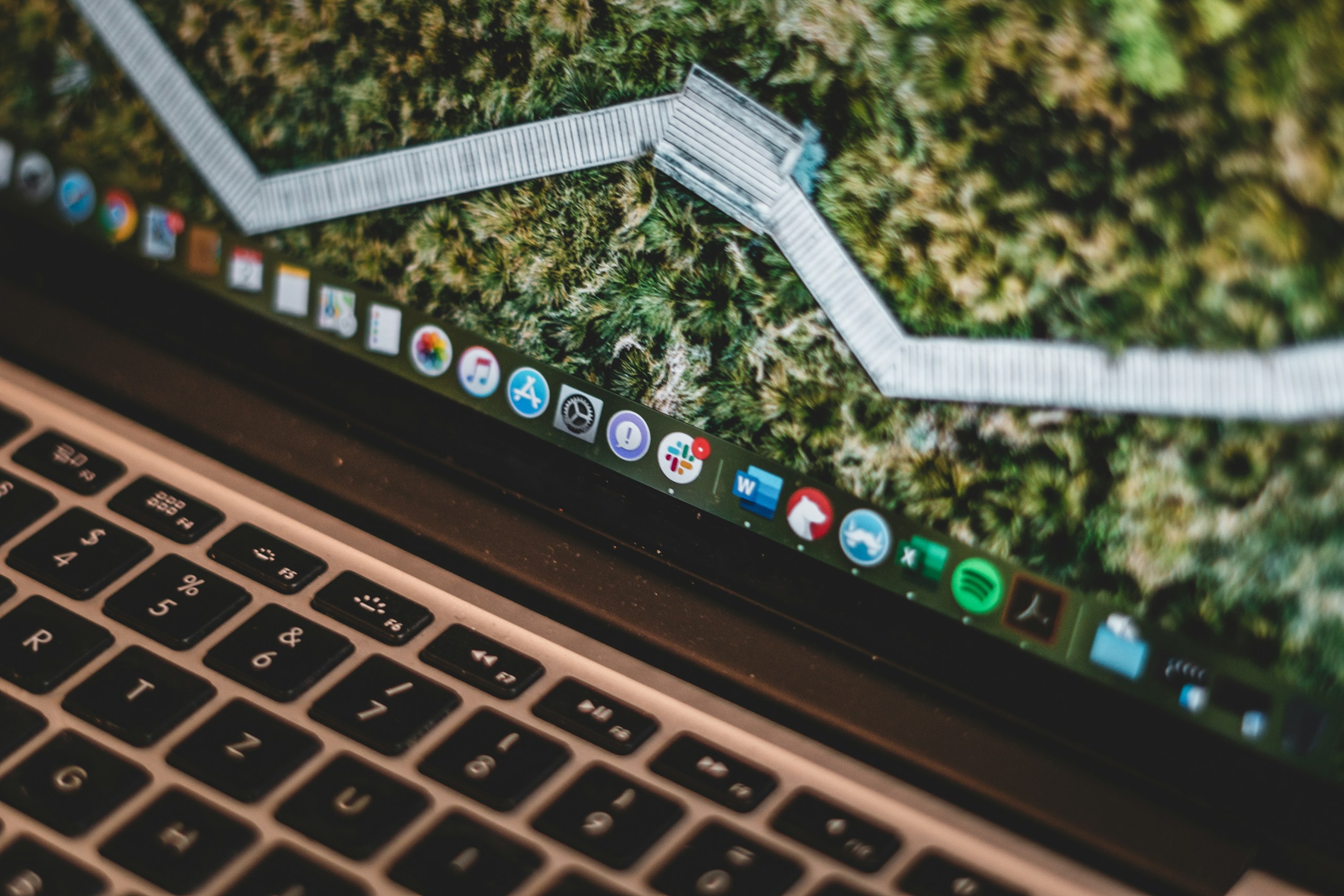 macbook pro displaying macos home screen