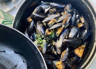 black fish on black round container