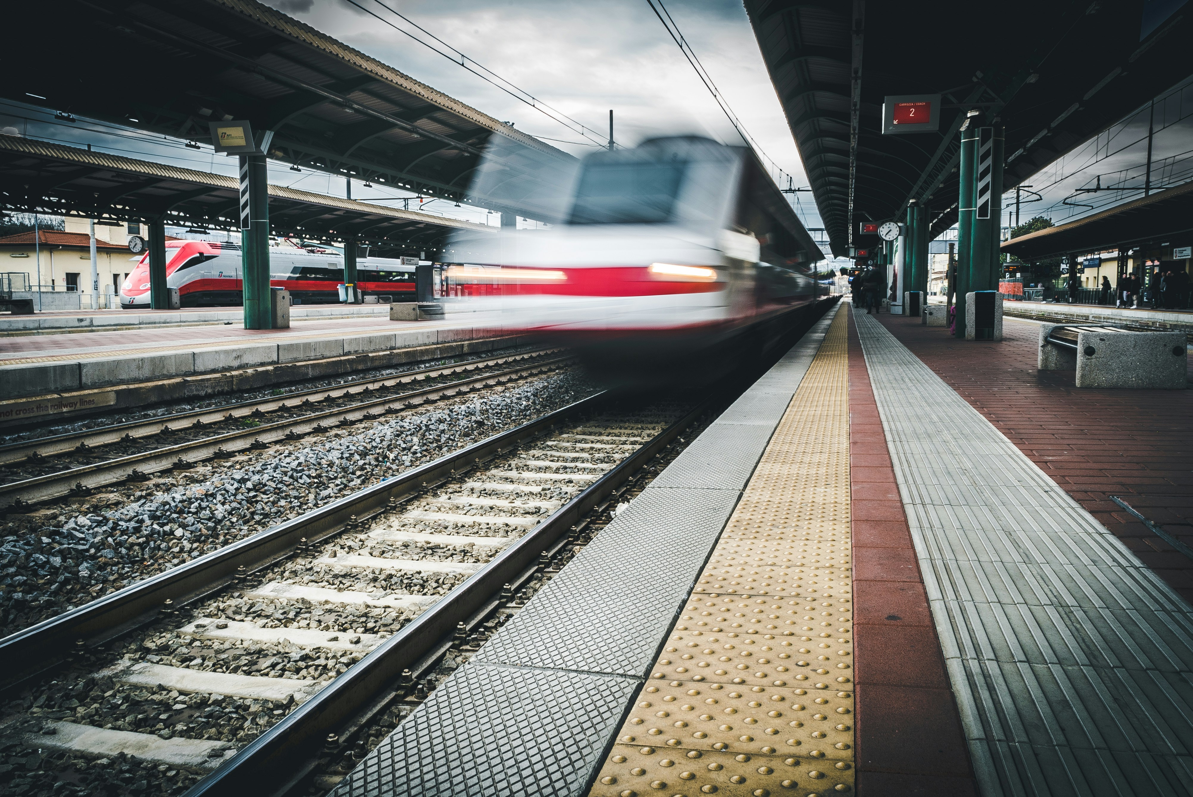 red and white train on rail way during daytime, Blur