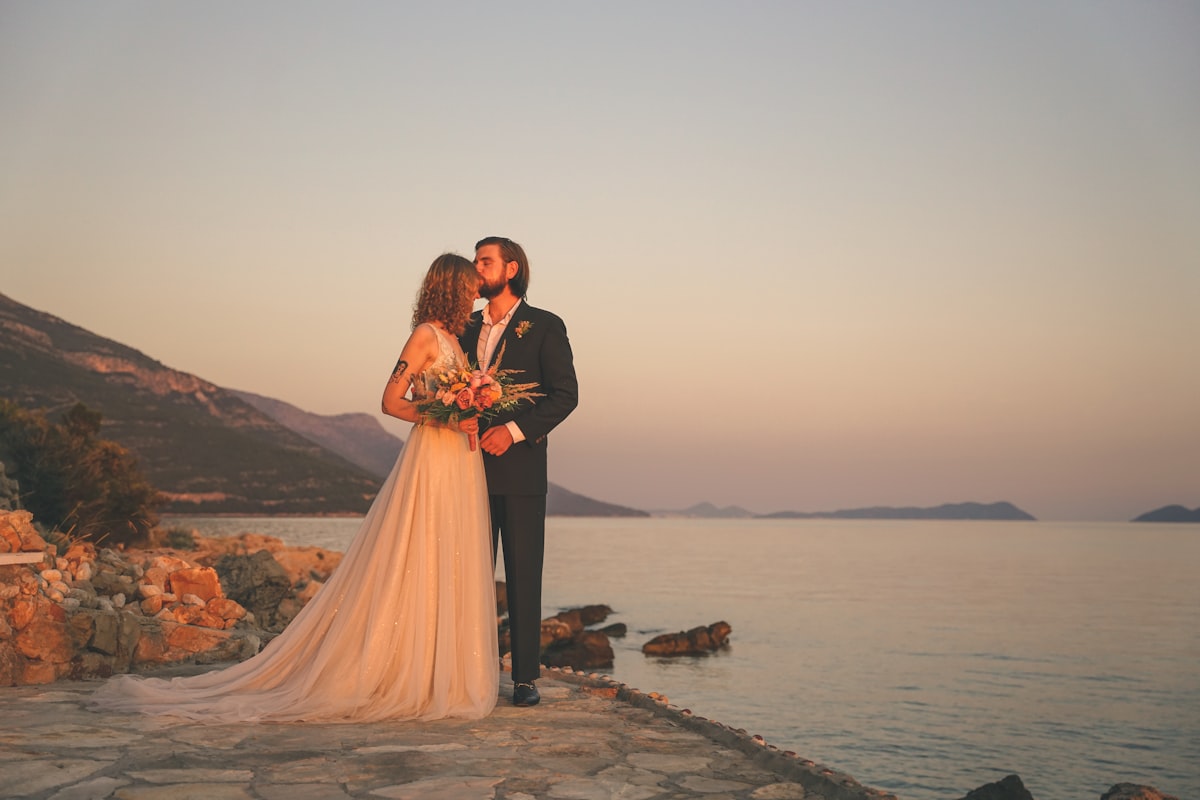 A man and woman holding hands together