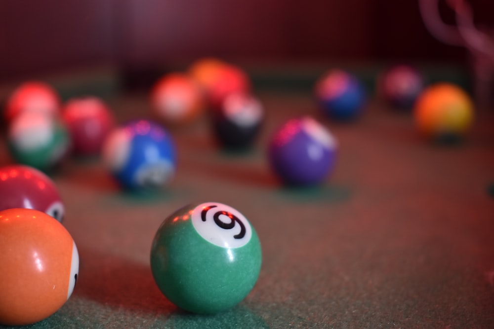 billiard balls on billiard table