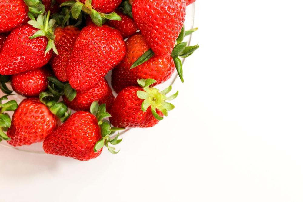 red strawberries on white background