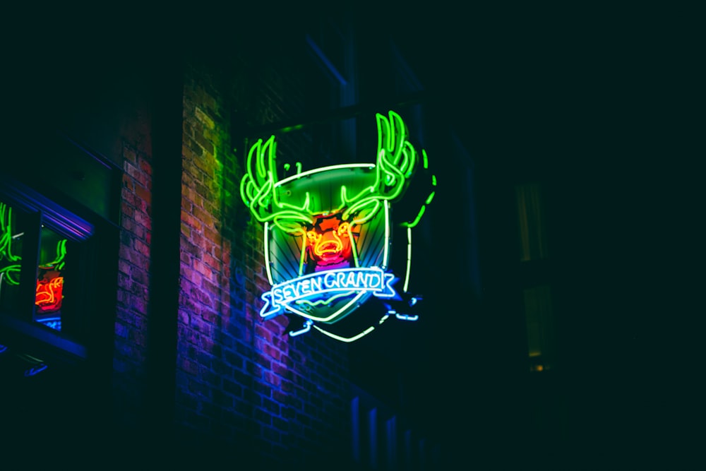 purple green and yellow neon light signage