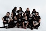 group of people sitting on white floor