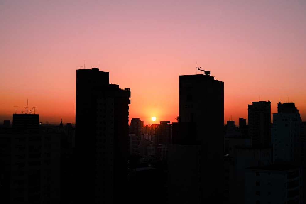 silhouette of building during sunset