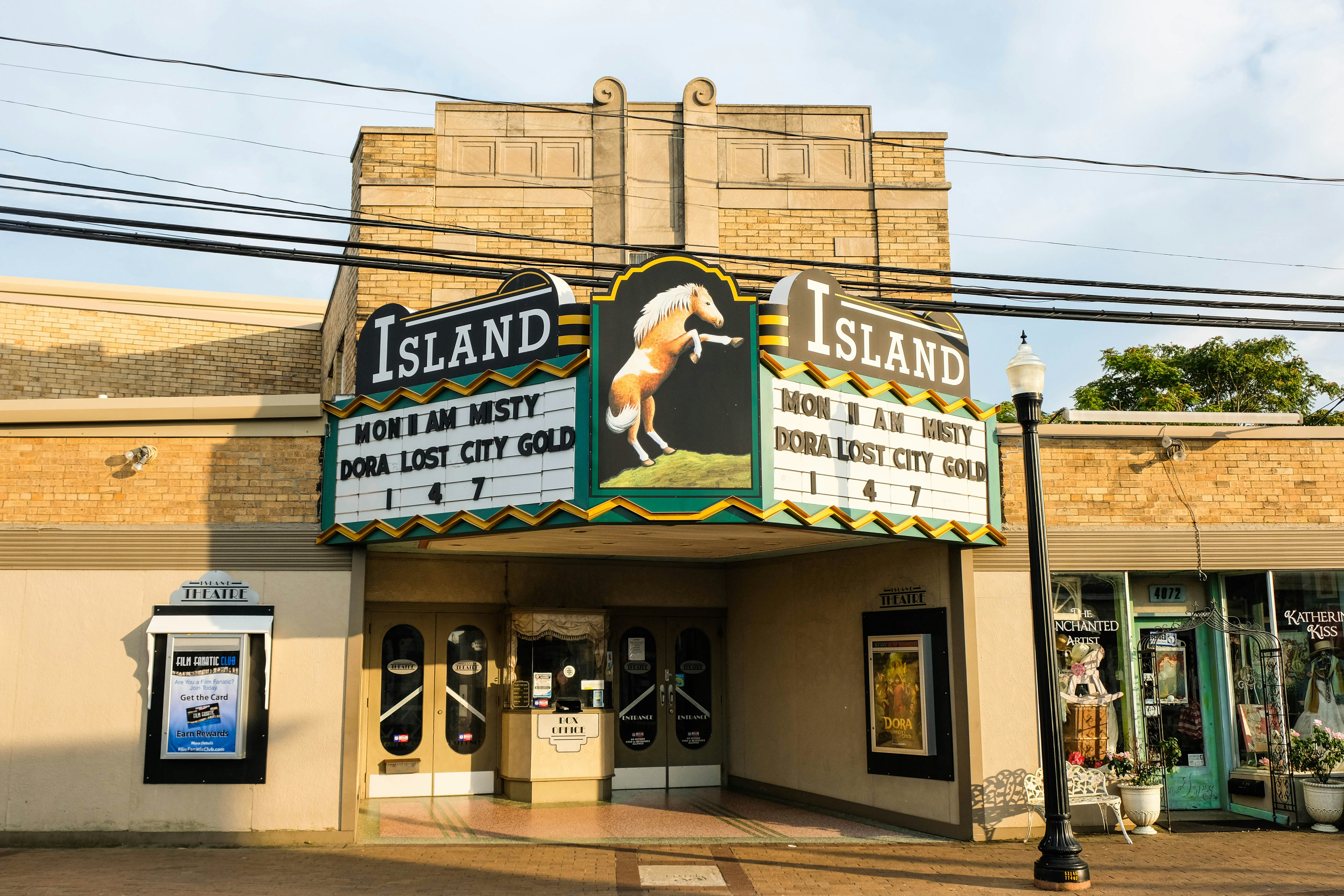 a sign on the side of a building that says island