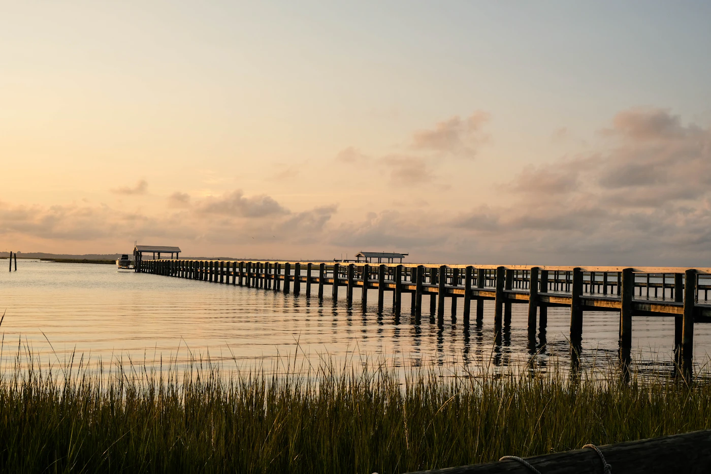 A wooden Chesapeake Bay dock at sunset