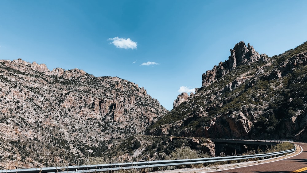 brown rocky mountain under blue sky during daytime