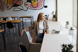 A successful woman entrepreneur sharing her story.