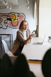 A technician happily receiving job details on a mobile device while on the move.