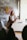 A satisfied customer sharing feedback at a modern office space.