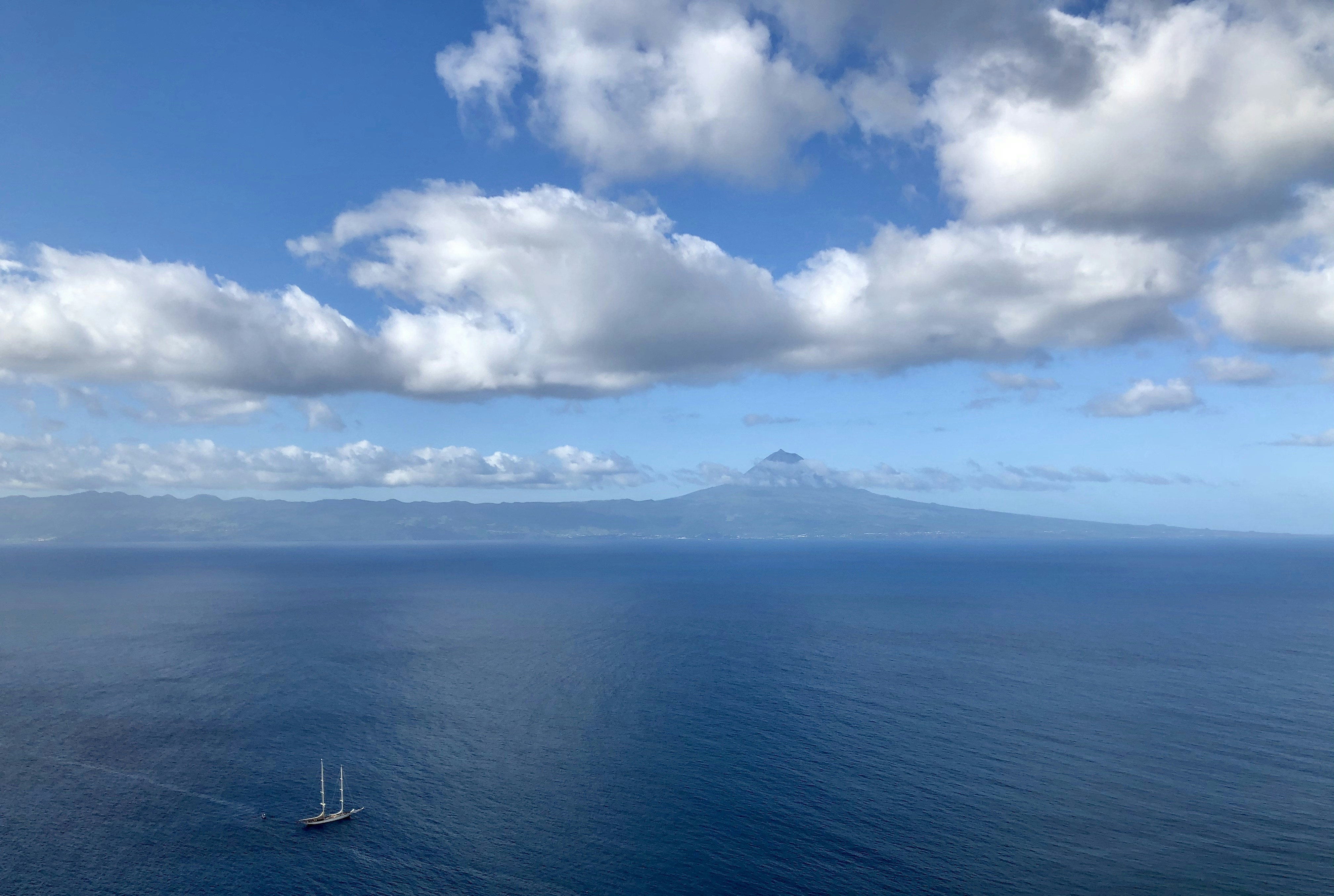 Boat and Pico island view from São Jorge