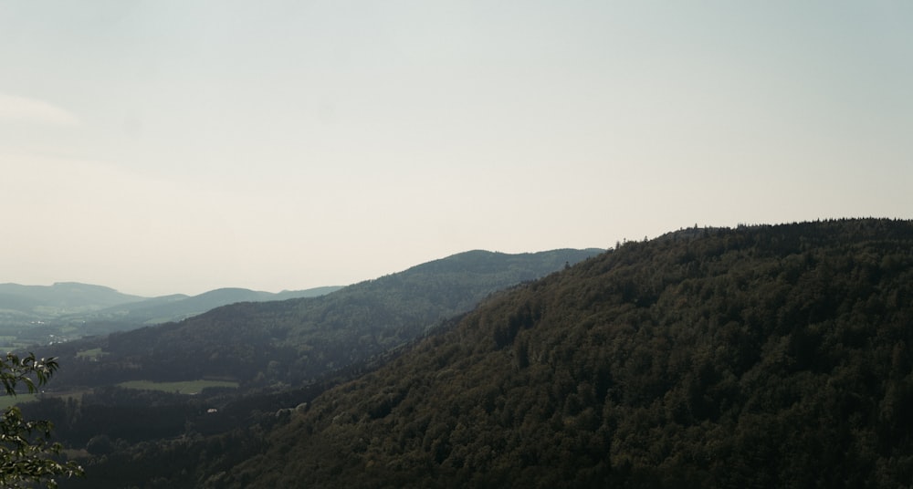 green mountains under white sky during daytime