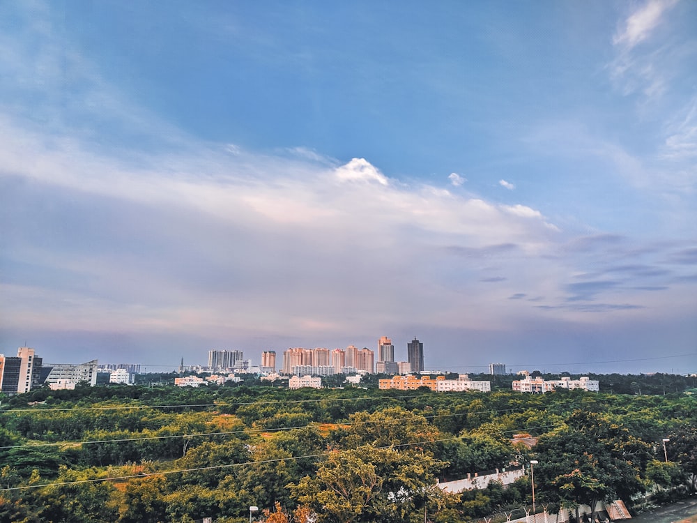 city buildings under blue sky during daytime