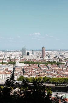 city buildings under blue sky during daytime