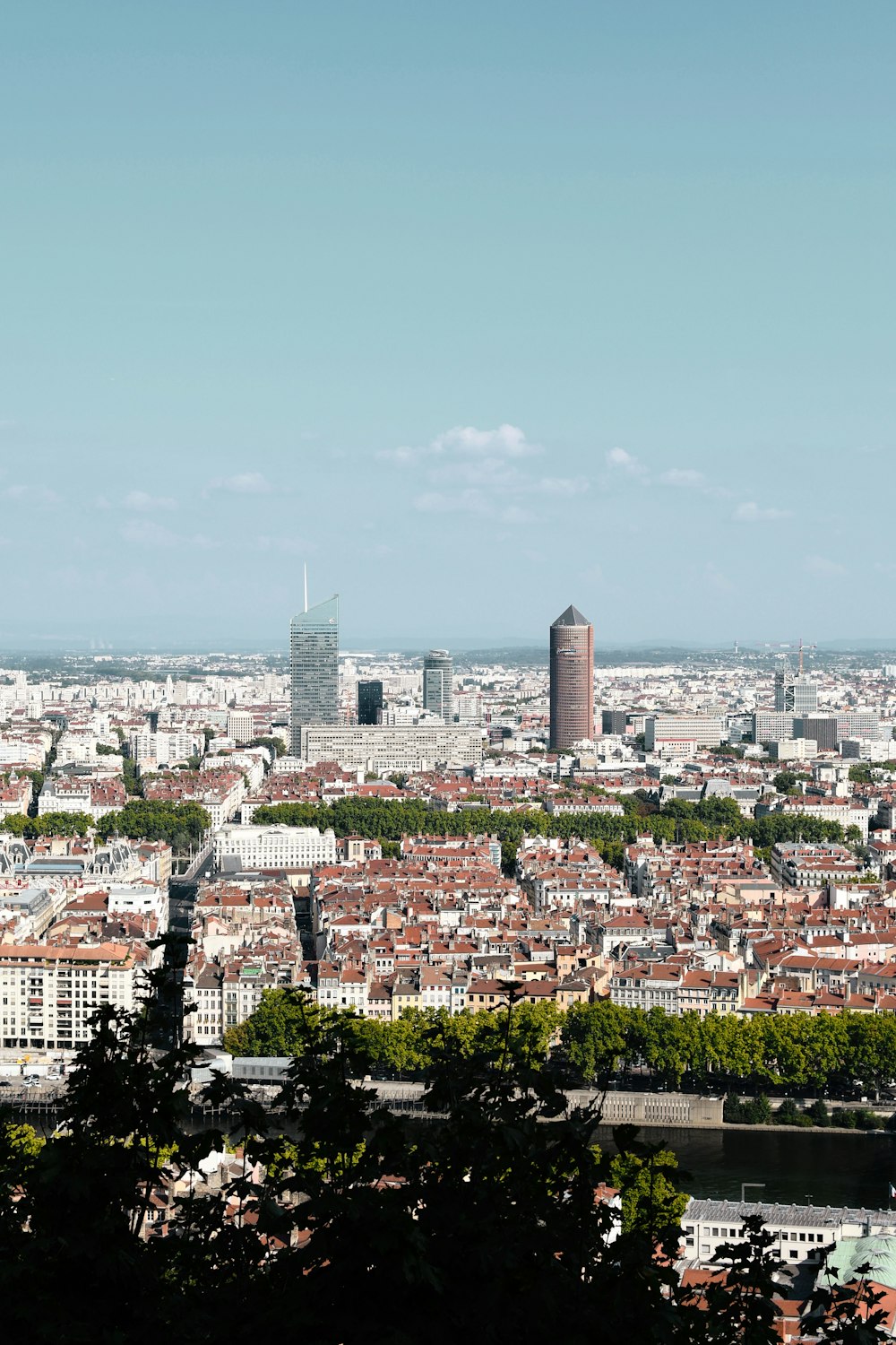 city buildings under blue sky during daytime