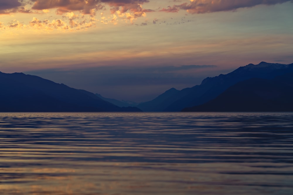 silhouette of mountains during sunset