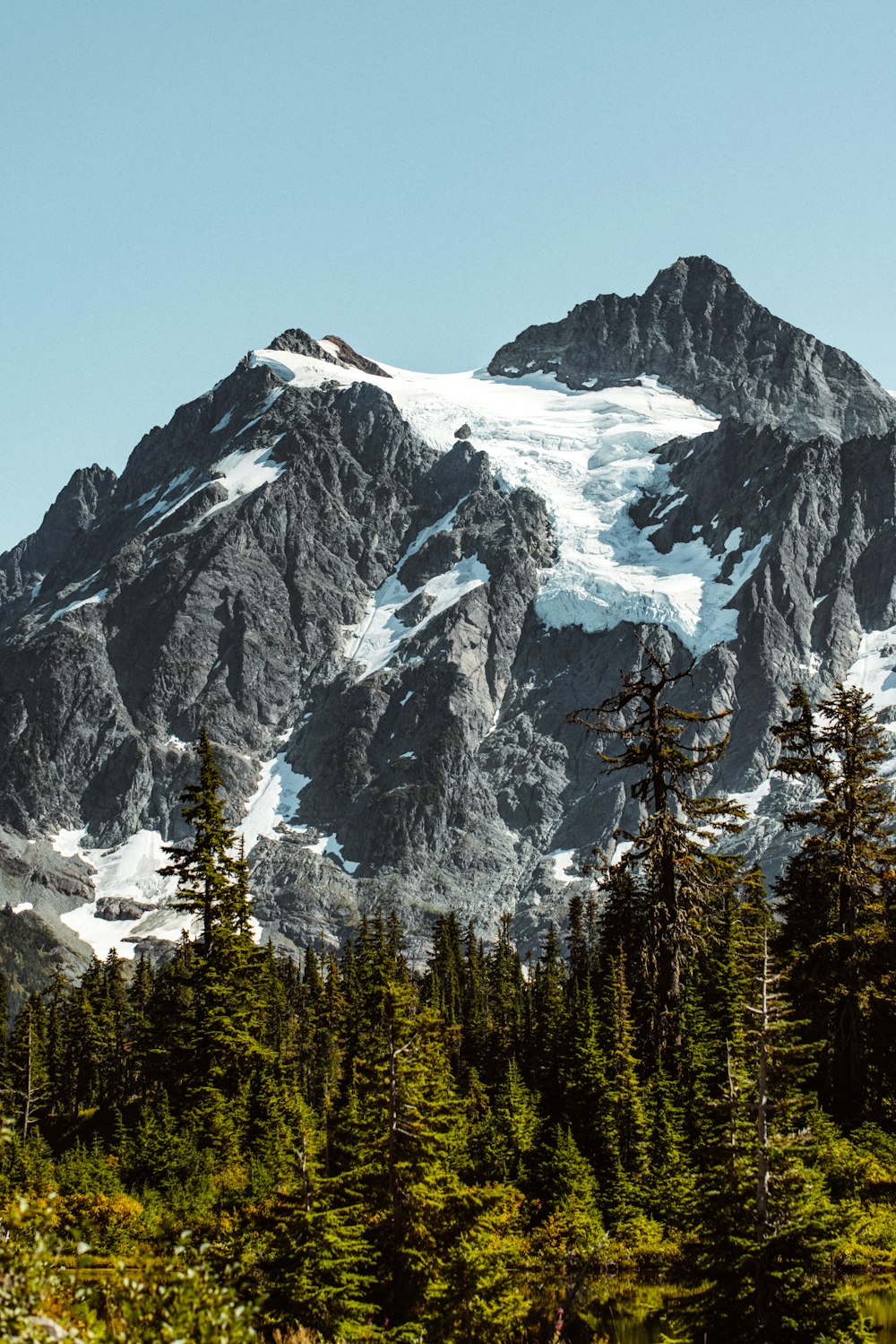 snow covered mountain during daytime