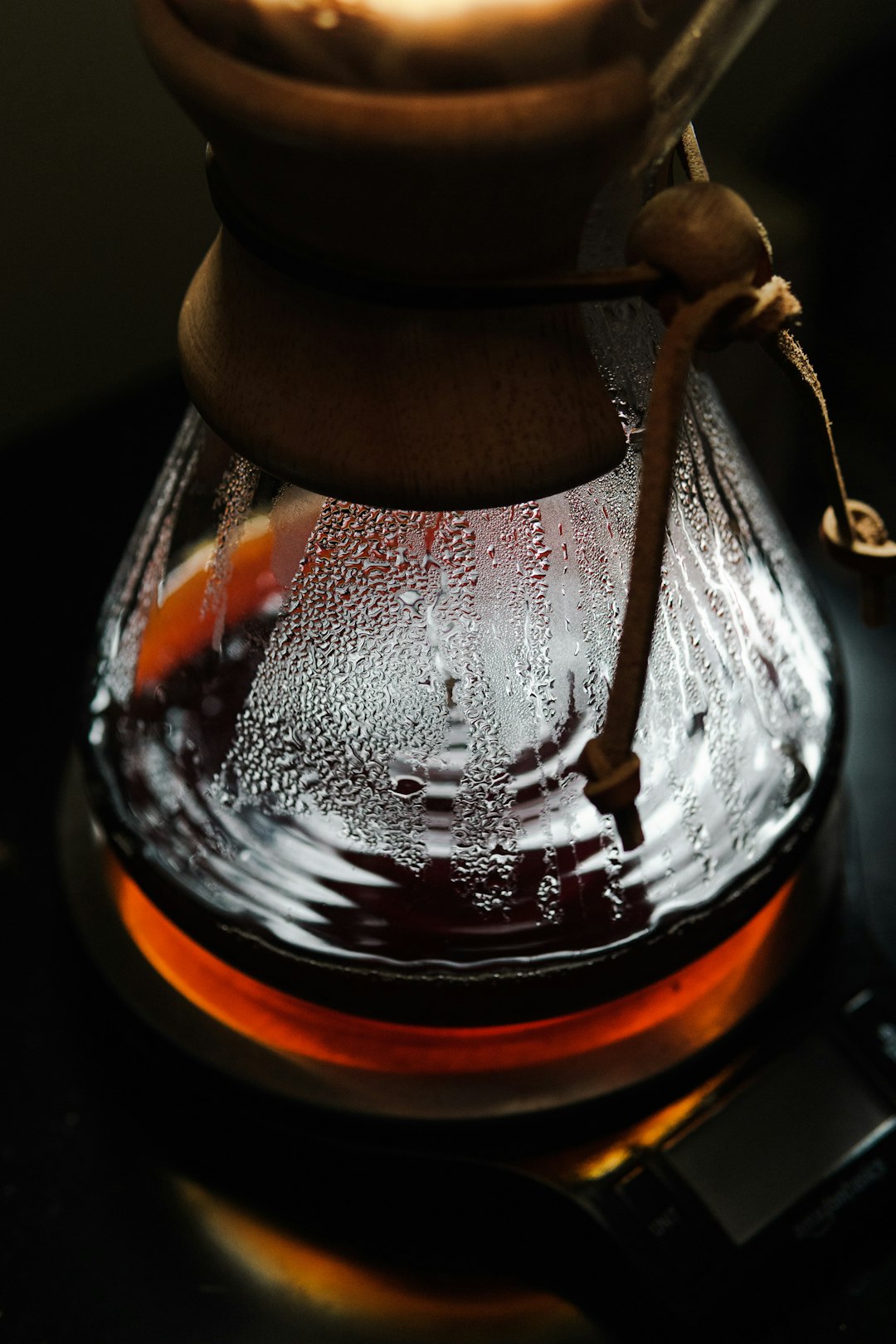 clear glass jar with brown liquid