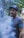 man in gray crew neck t-shirt wearing black cap