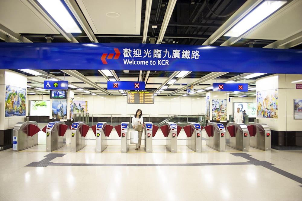 people in white uniform standing on white floor tiles