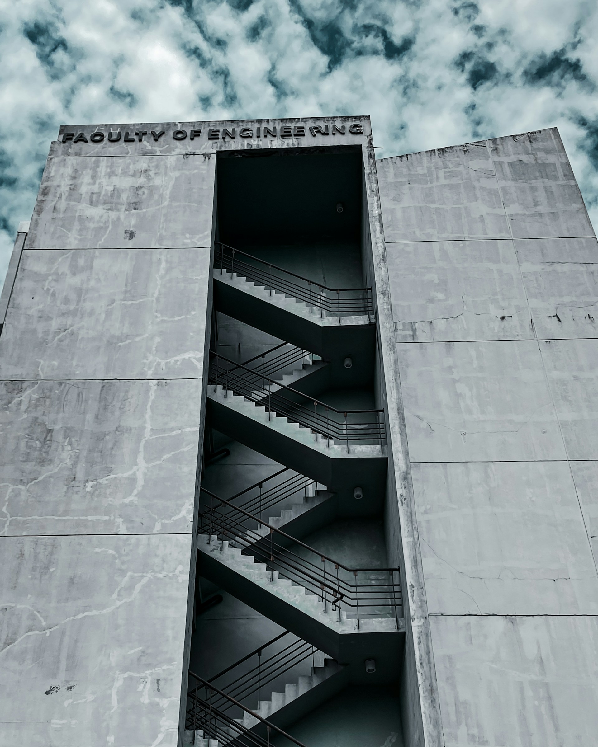 black and brown leather padded tub sofa