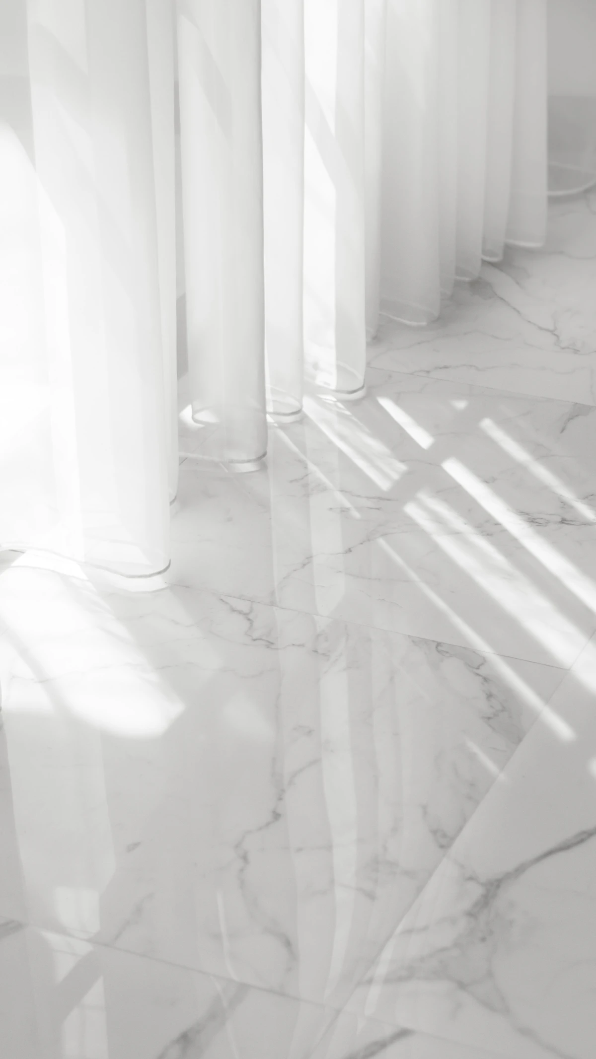 PLACEHOLDER white and brown floor tile (stock image) — replace with an actual Diamond Tub Refinishing project photo