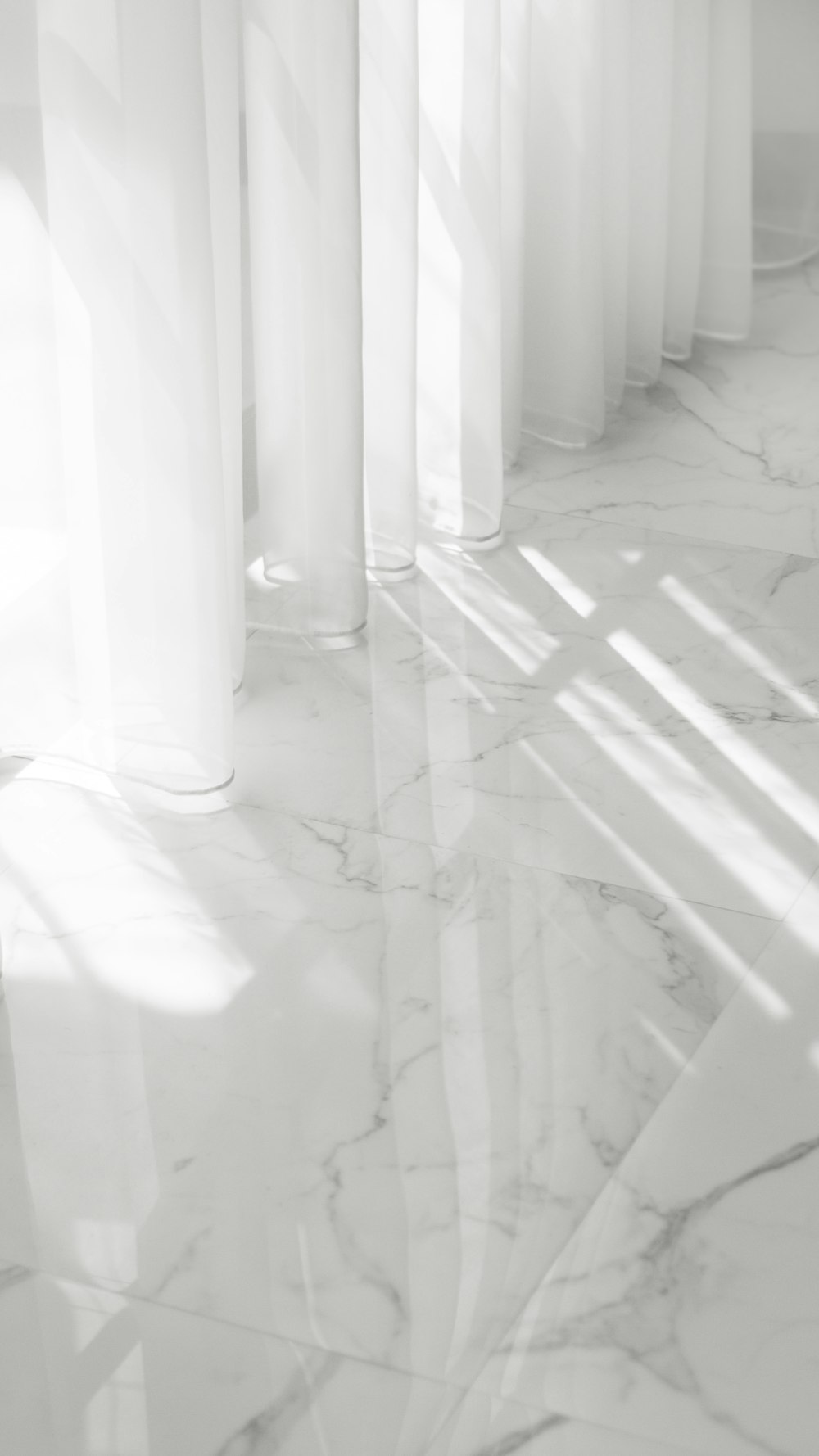 white and brown floor tiles