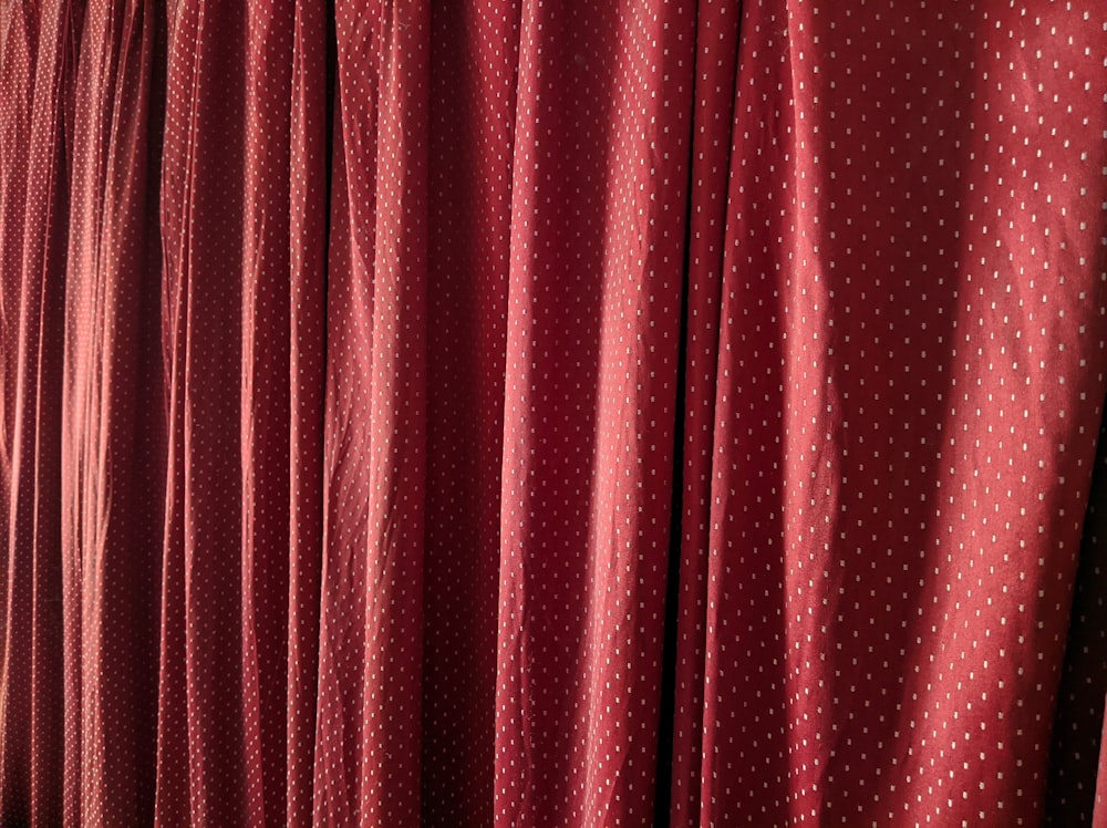 red curtain on white wall