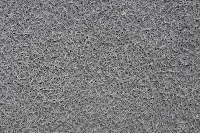 Microscope view of delicate intertwining fibers representing complex small-scale systems.