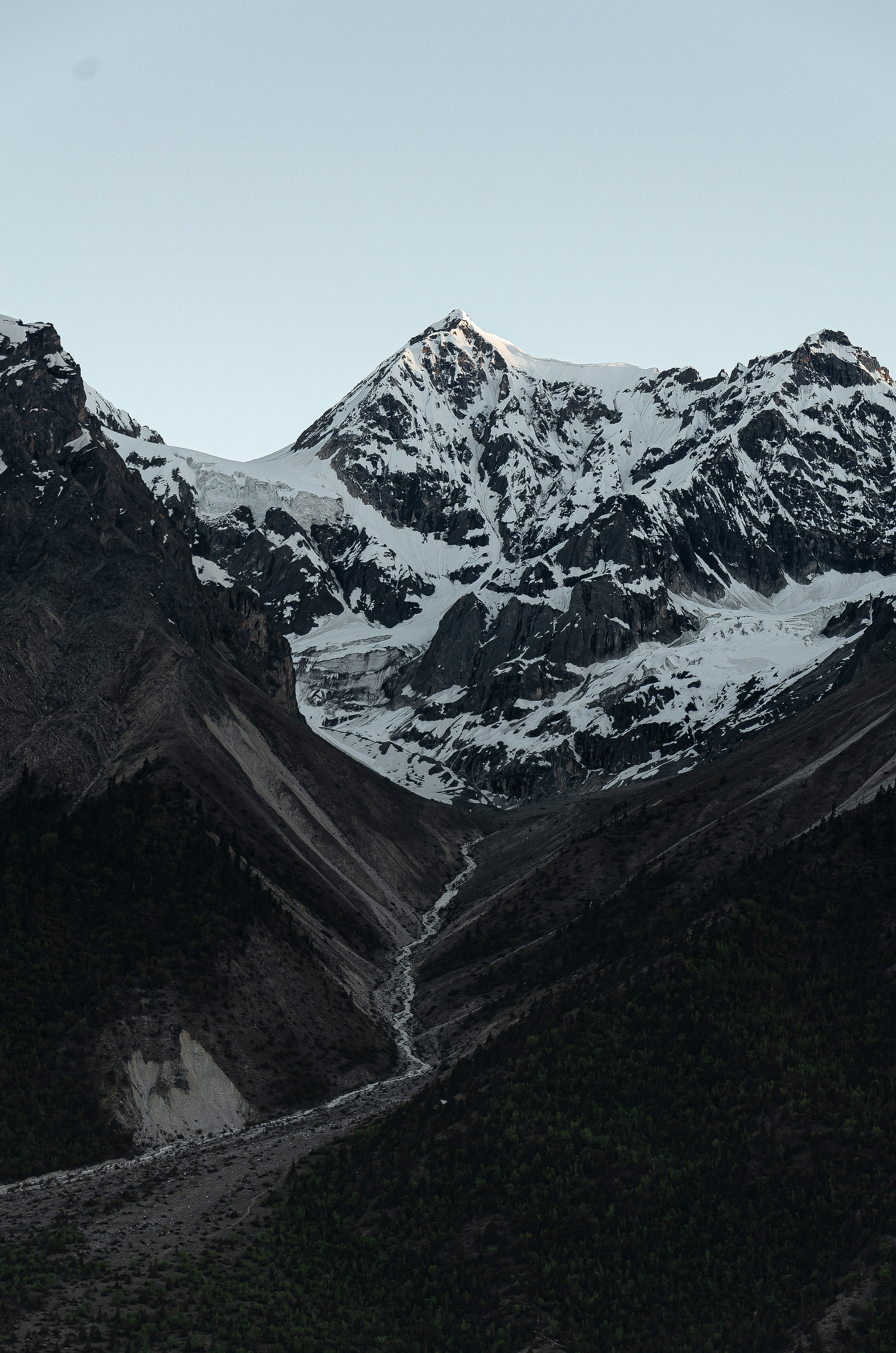 snow covered mountain during daytime
