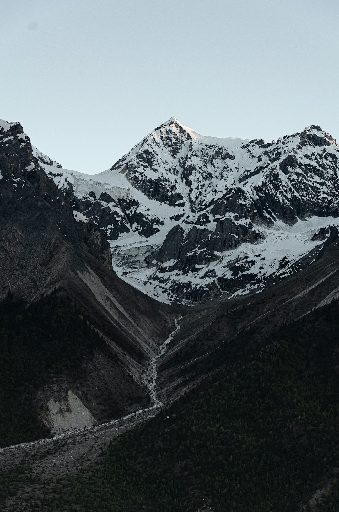 snow covered mountain during daytime