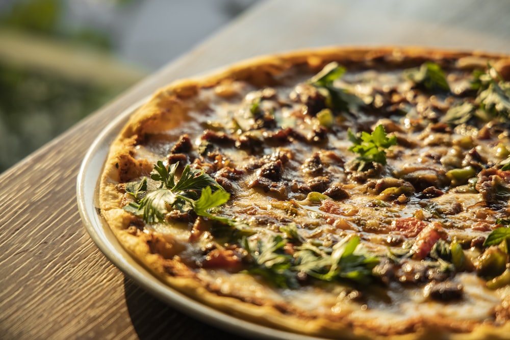 pizza on brown wooden table