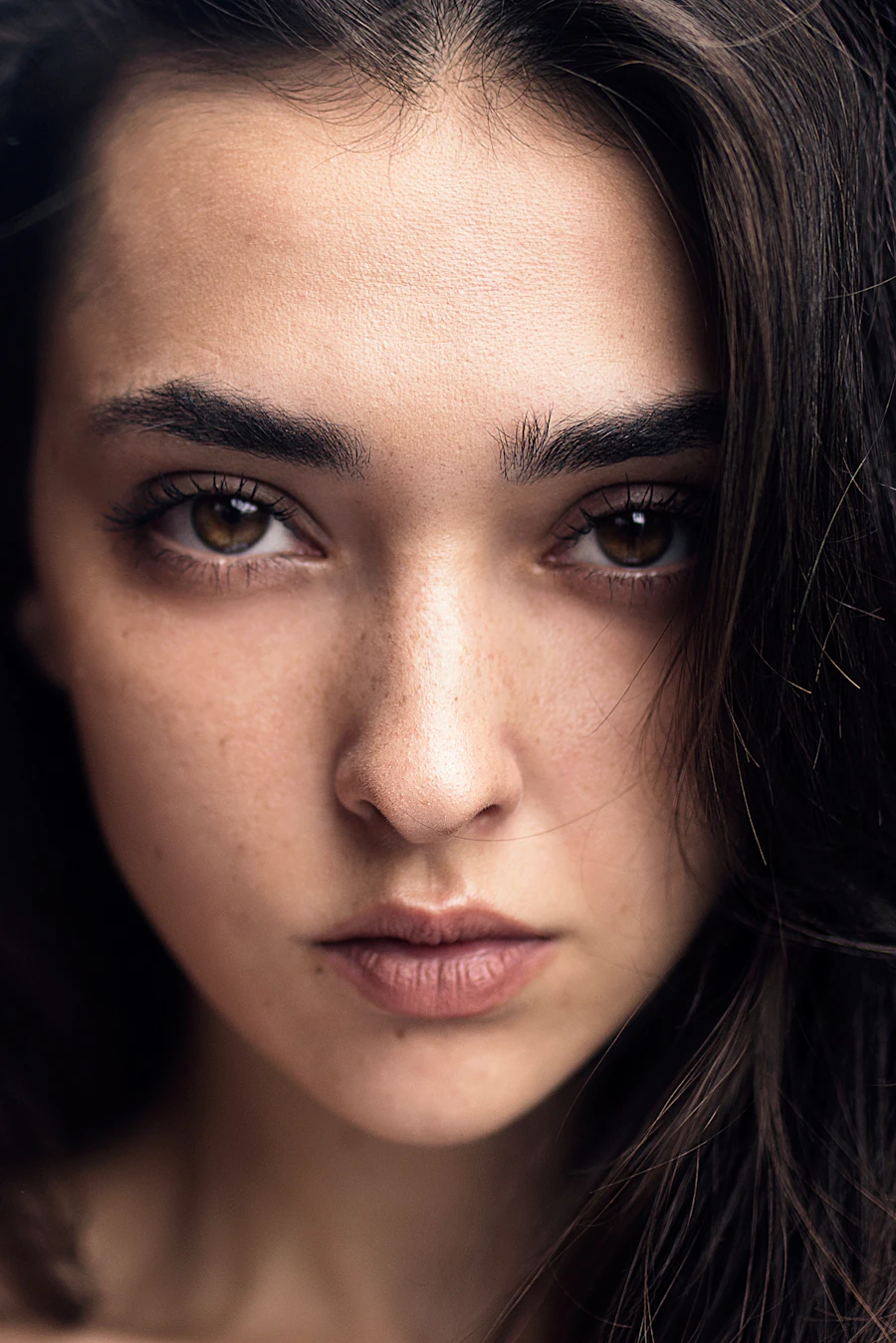 The forehead area of a woman's face